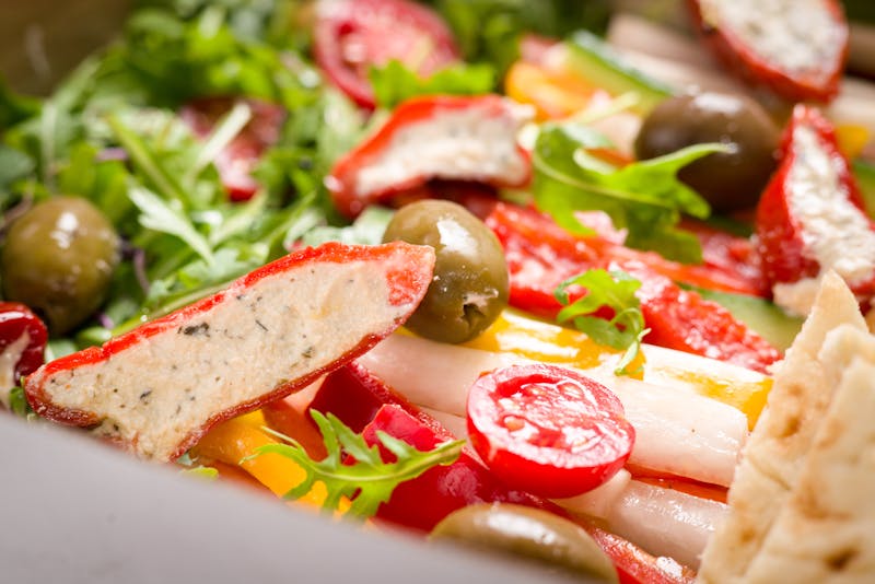 Premium seafood pizza on coal-fired crust at Anthony's pizza